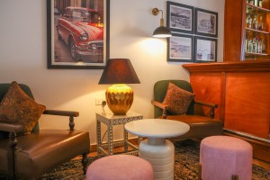 The wood-panelled 1950s Bar, with its herringbone floor, leather seating, framed prints and shelved spirits.