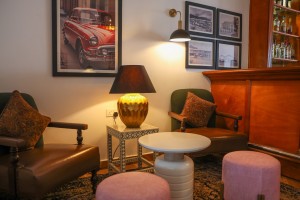 The wood-panelled 1950s Bar, with its herringbone floor, leather seating, framed prints and shelved spirits.