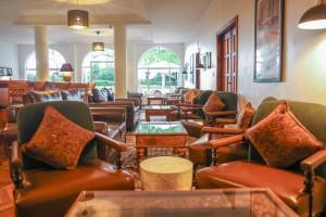 The wood-panelled 1950s Bar, with its herringbone floor, leather seating, framed prints and shelved spirits.