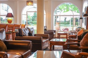 The wood-panelled 1950s Bar, with its herringbone floor, leather seating, framed prints and shelved spirits.